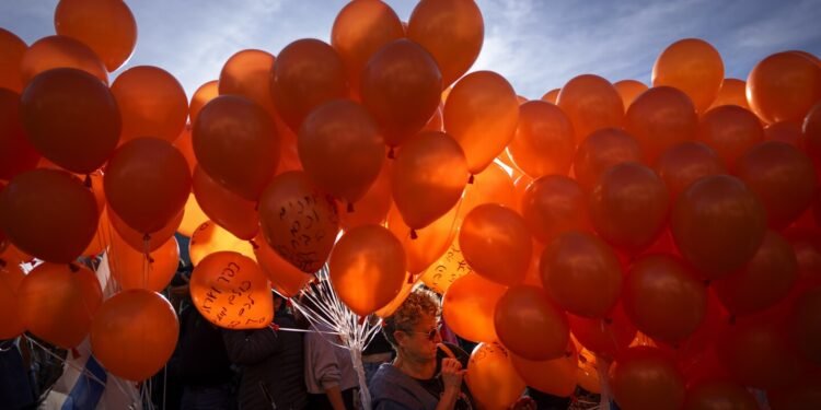 As the youngest Israeli hostage turns 1, his family pleads for a deal to release more from Gaza