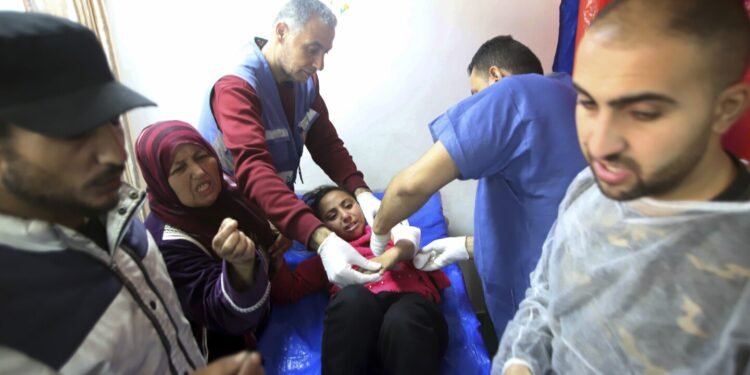 Gaza’s Health Ministry blames Israeli troops for deadly shooting as crowd waited for aid