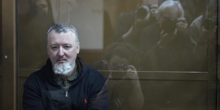 Russian courts jail a Putin critic and a woman convicted of a blast that killed a pro-war blogger