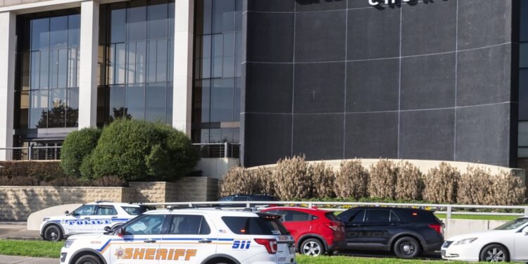 Shooter entered Texas megachurch with young son and used AR-style rifle in the attack, police say