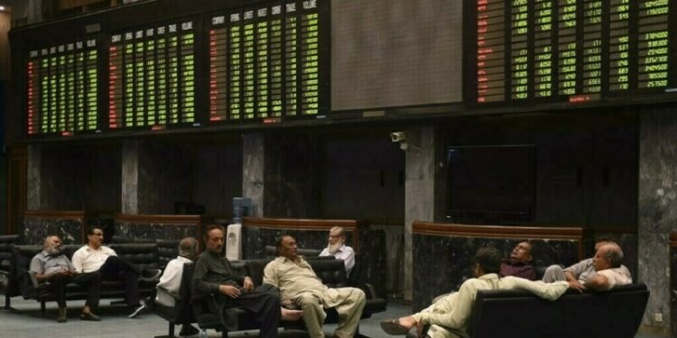 KSE-100 retreats from record high but still closes above 67,000