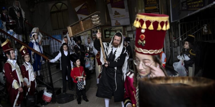 During the Israel-Hamas war, Jews will soon celebrate Purim — one of their most joyous holidays
