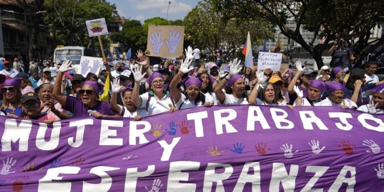 Facing historic shifts, Latin American women bathe streets in purple on International Women’s Day