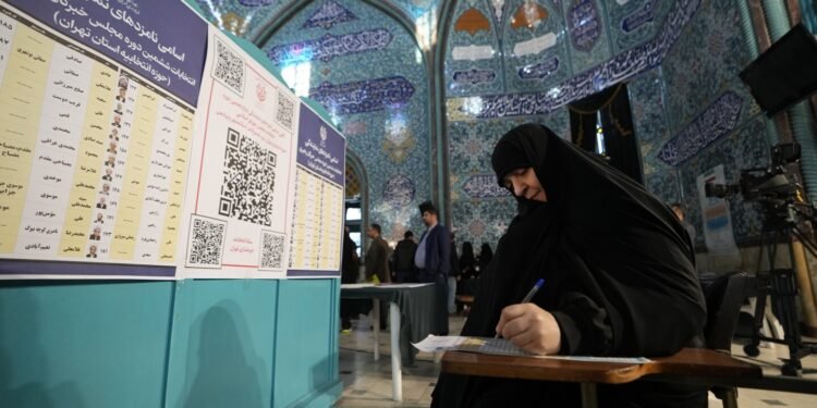 Iran begins voting in first parliament election since 2022 protests as questions over turnout loom