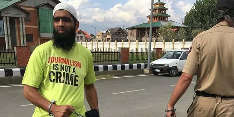 Kashmiri journalist re-arrested hours after arriving home from jail