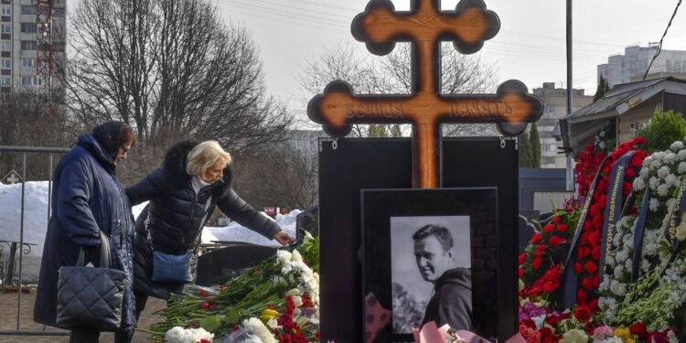 Navalny’s mother brings flowers to his grave a day after thousands attended his funeral in Moscow