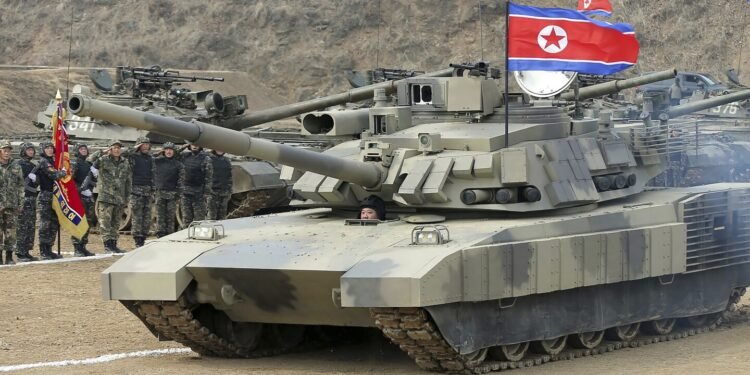 North Korea’s Kim drives new-type tank during drills and calls for efforts to prepare for war