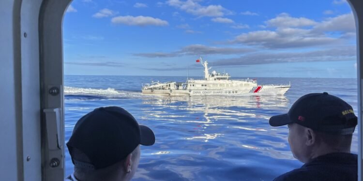 Philippine and Chinese boats collide in their latest confrontation over a South China Sea shoal