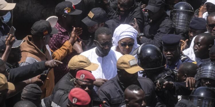 Senegal voted in a tightly contested presidential race after months of unrest