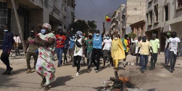 Senegal’s top opposition leader freed from prison ahead of presidential election, lawyer says