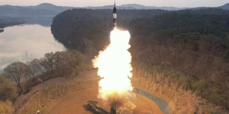 North Korea says it tested new solid-fuel intermediate-range missile with hypersonic warhead
