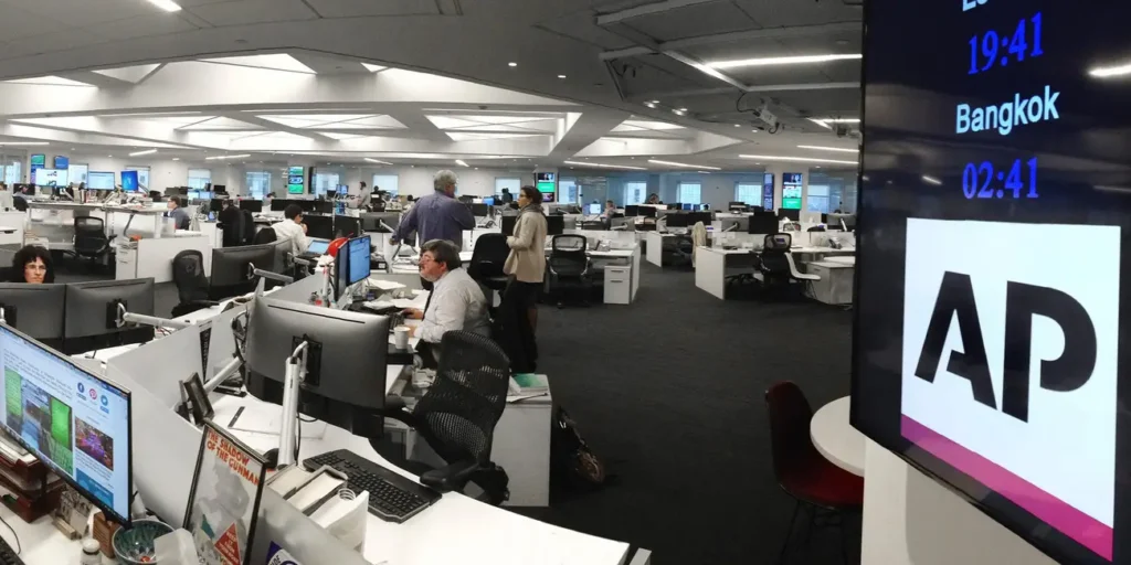 Associated Press cuts newsroom jobs across 12 states, sparks outsourcing backlash