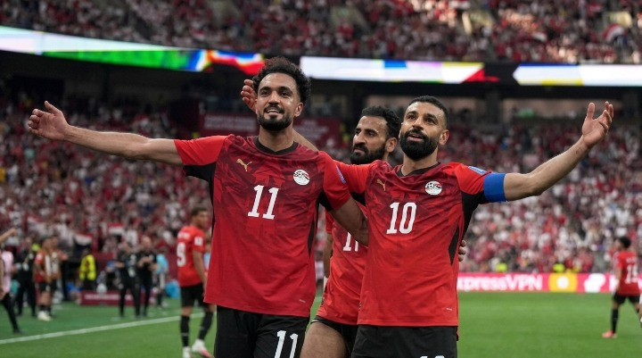 Can Egypt Shock World Cup Stage? Salah Stars in 3-1 Win Footballers celebrating on field