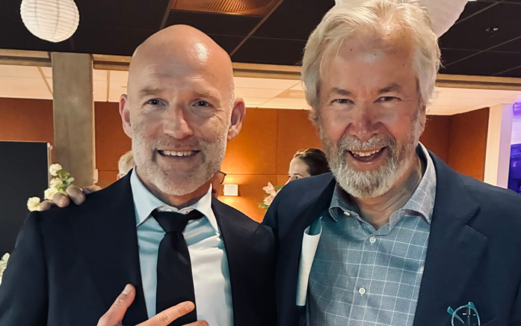 Two media giants in one frame