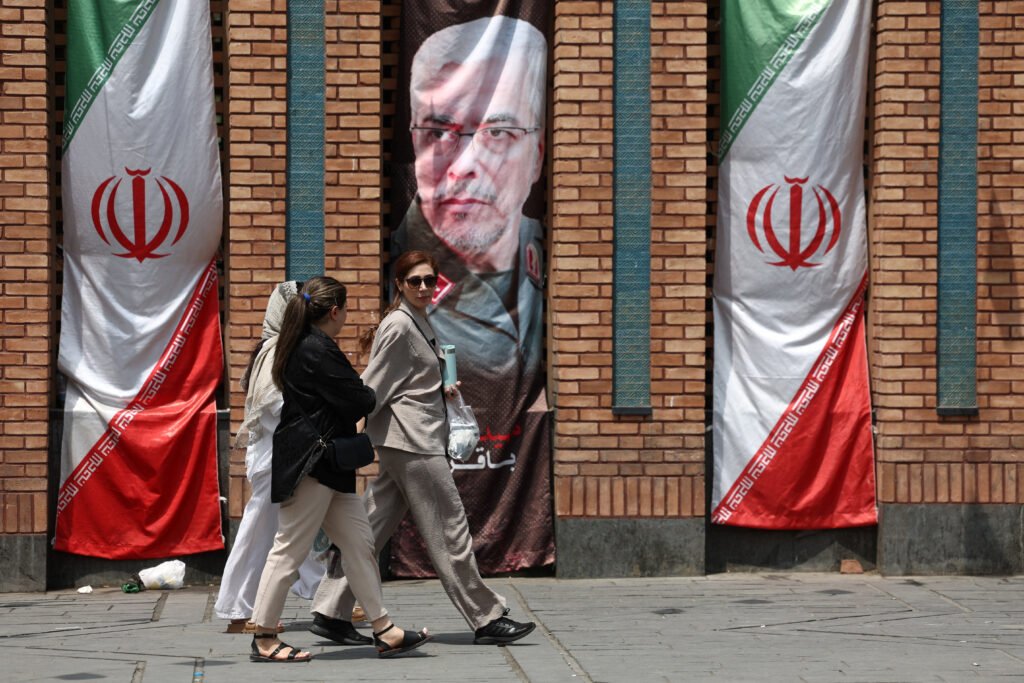 Iran claims attacks on US assets in Bahrain and Kuwait as tanker fires raise fears in Strait of Hormuz